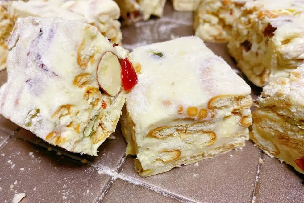 雪花酥的制作方法及材料 雪花酥是牛扎糖嗎 雪花酥的制作方法及材料 雪花酥是牛扎糖嗎